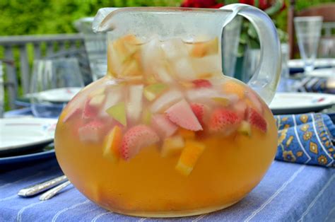 white-sangria-with-apples-oranges-and-strawberries image