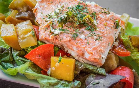 roasted-vegetable-salad-topped-with-salmon image