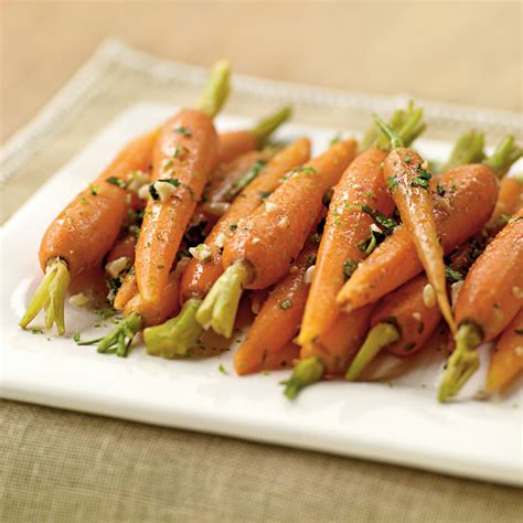 steamed-carrots-with-garlic-ginger-butter image