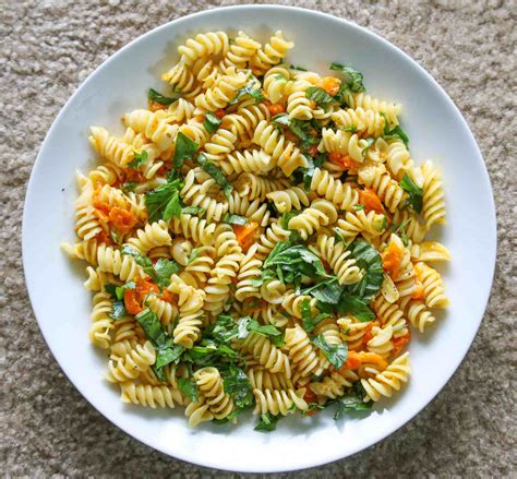 fusilli-pasta-with-cherry-tomatoes-basil-leaves-by image