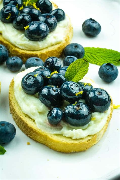 blueberry-honey-whipped-ricotta-crostini-must-love image