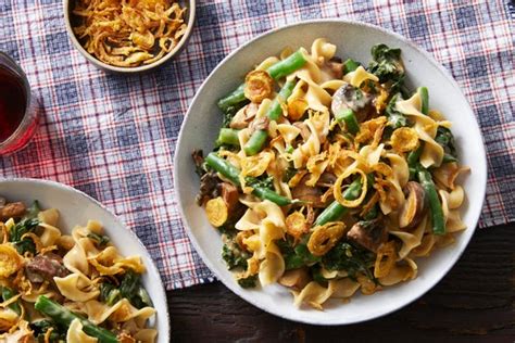 cheesy-egg-noodles-with-mushrooms-crispy-onions image