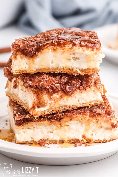 sopapilla-cheesecake-bars-recipe-with-drizzled-honey image