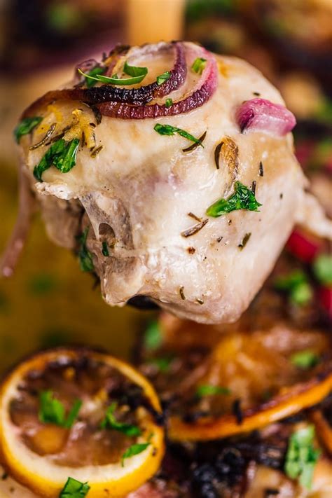 easy-baked-lemon-garlic-chicken-thighs-with-onions image