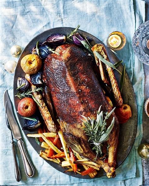 roast-goose-with-roast-apples-and-onions-and-potato image