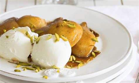 roasted-pears-with-pistachios-and-vanilla-ice-cream image