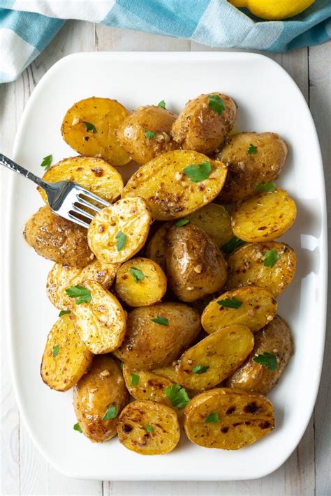 greek-lemon-garlic-roasted-potatoes-recipe-a-spicy image