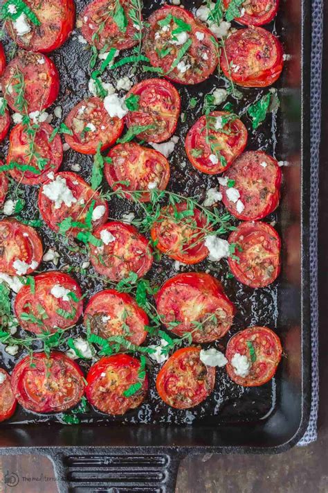 quick-oven-roasted-tomatoes-recipe-the-mediterranean-dish image