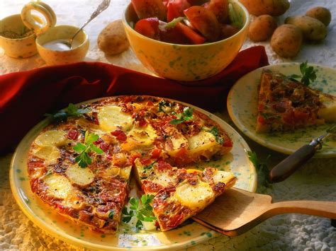 spanish-tortilla-with-potatoes-tomatoes-and-bell image