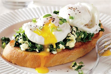 poached-eggs-on-spinach-feta-toast-canadian-living image
