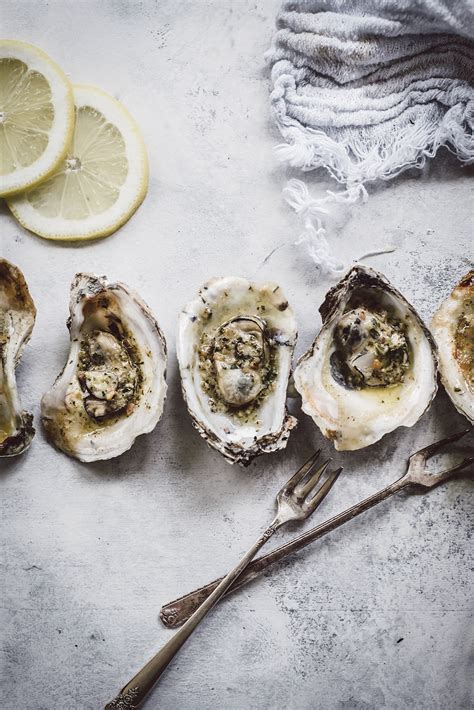grilled-oysters-with-bacon-cayenne-butter-regan-baroni image