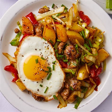 potato-hash-with-sausage-fried-egg-eatingwell image