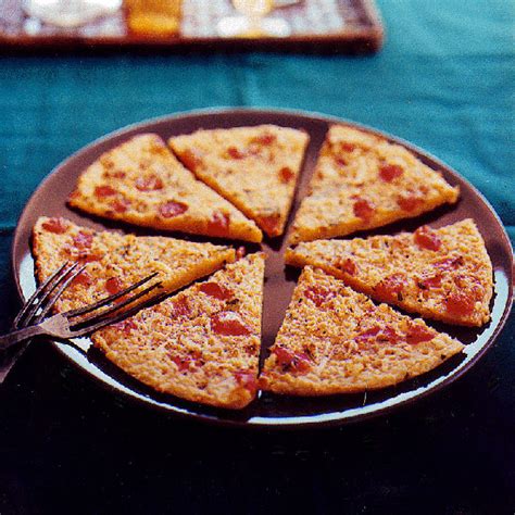 chickpea-flour-pizza-with-tomato-and-parmesan image