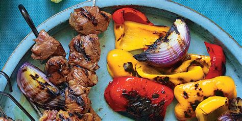 lemony-grilled-lamb-kebabs-with-peppers-onions image