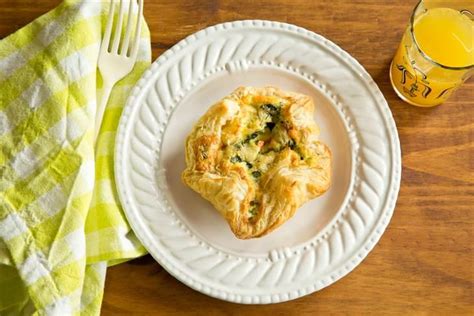 make-ahead-spinach-and-artichoke-baked-egg-souffls image