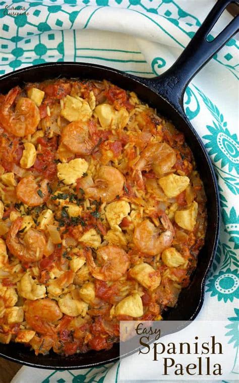 easy-shrimp-and-chicken-paella-curious-cuisiniere image