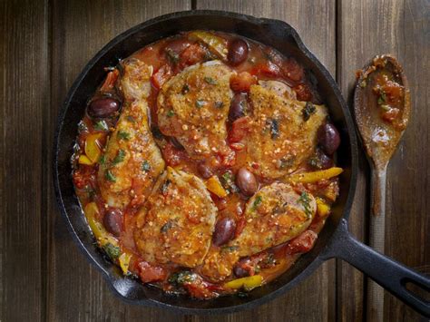 easy-chicken-thighs-with-tomatoes-recipe-the-spruce image