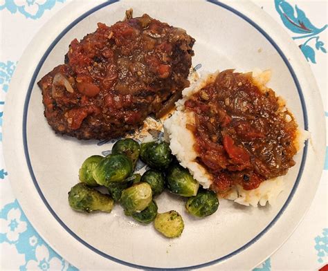 old-fashioned-beef-cube-steak-with-tomato-gravy-at image