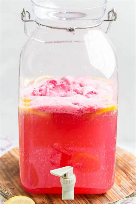 pink-party-punch-with-sherbet-party-food-favorites image