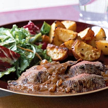 rosemary-merlot-flank-steak-recipe-myrecipes image