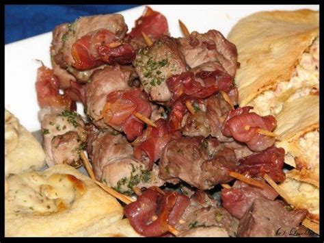 finger-food-lamb-proscuitto-and-sage-skewers image