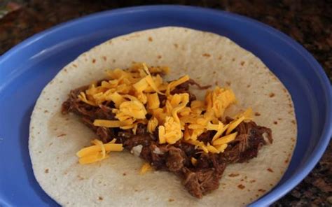 shredded-beef-burritos-the-happy-housewife image