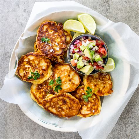 cheesy-corn-cakes-with-spicy-avocado-salsa-simply image