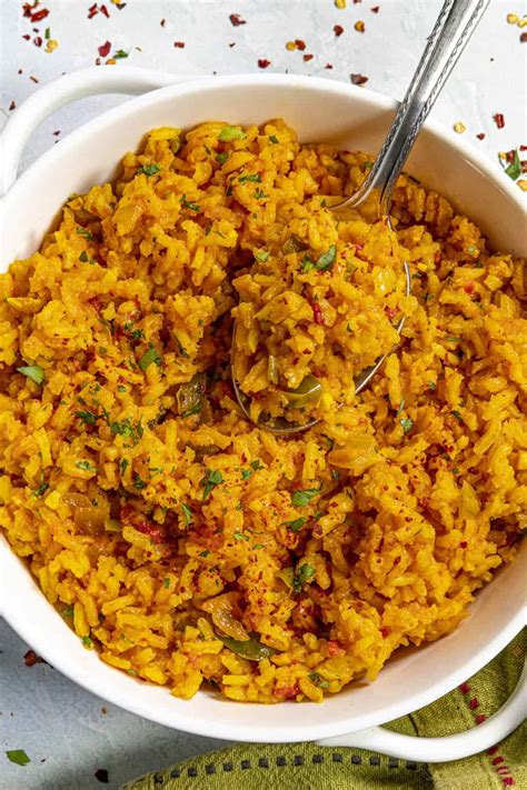 yellow-rice-recipe-arroz-amarillo-chili-pepper image
