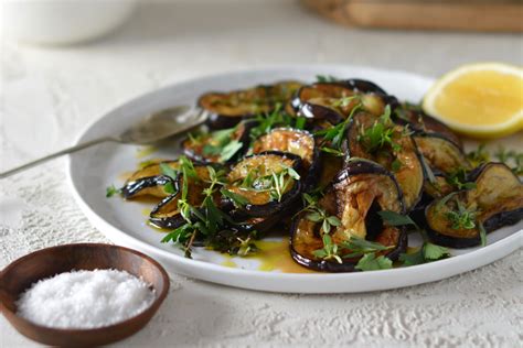 pan-fried-eggplant-with-herbs-recipe-maggie-beer image