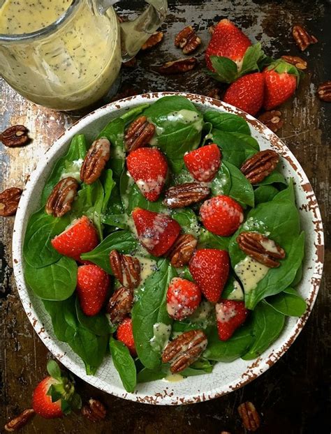 spinach-salad-with-strawberries-pecans image