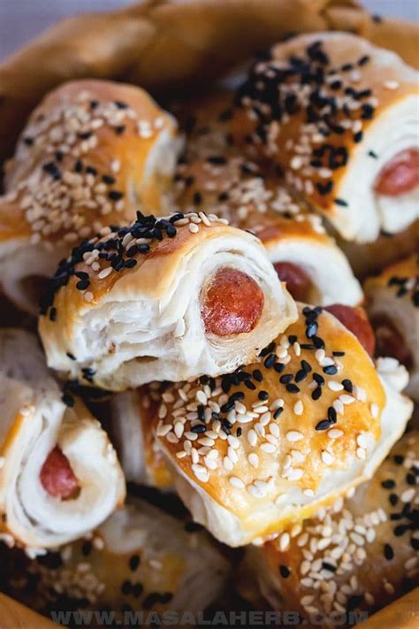 how-to-make-pigs-in-a-blanket-with-canned-biscuits image