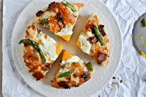 bacon-egg-asparagus-personal-pizzas image