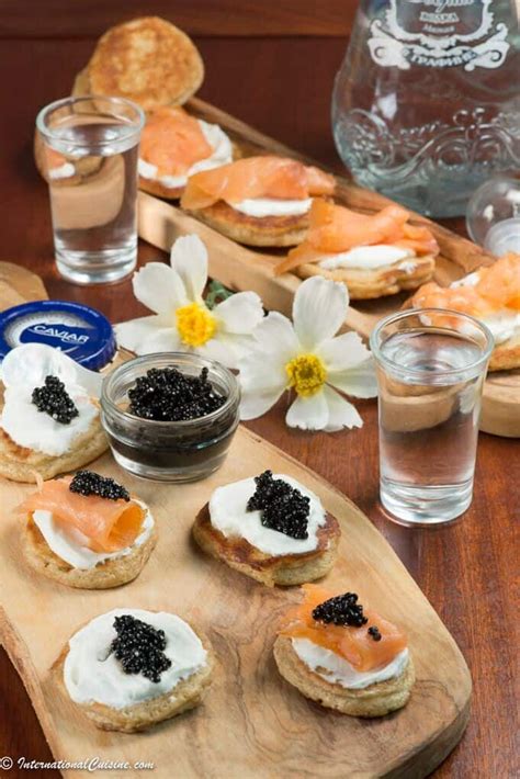 russian-blinis-with-sour-cream-caviar-and-salmon image