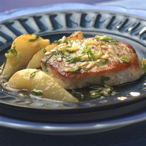 pork-chops-with-pear-ginger-sauce-recipe-eatingwell image