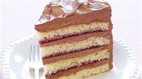 four-layer-cake-with-buttercream-recipe-finecooking image