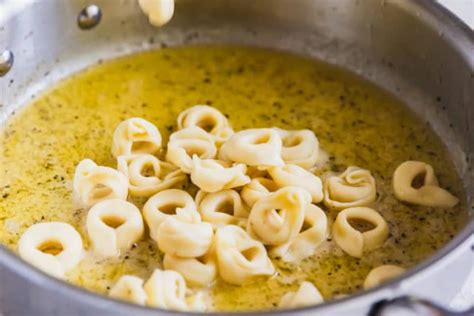 cheese-tortellini-in-garlic-sauce-culinary-hill-kitchn image