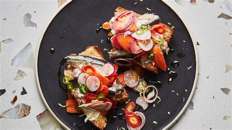 spicy-marinated-vegetables-and-sardines-on-toast image