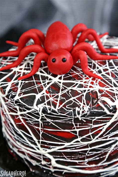 red-velvet-marshmallow-spiderweb-cake-sugarhero image
