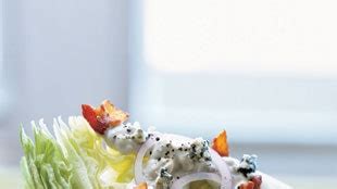 iceberg-wedge-with-warm-bacon-and-blue-cheese-dressing image