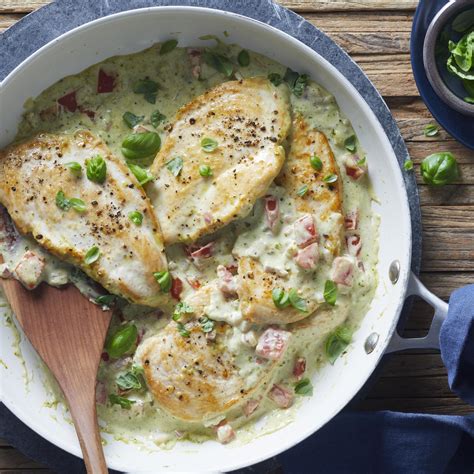 20-minute-creamy-pesto-chicken-cutlets-eatingwell image
