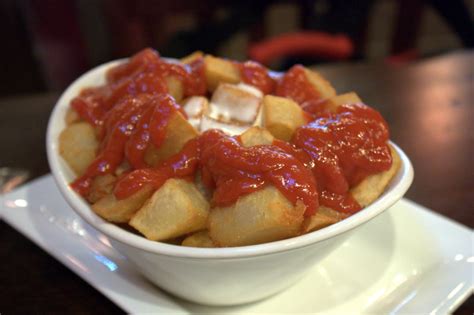 easy-patatas-bravas-recipe-with-spicy-tomato-sauce image