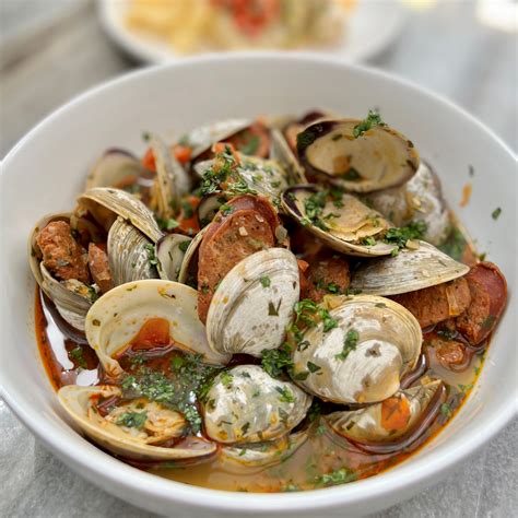 chorizo-and-clams-on-the-grill-emerilscom image