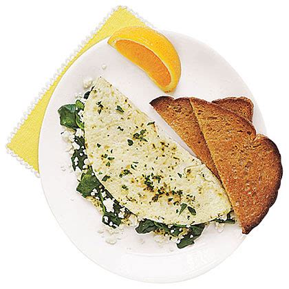 egg-white-omelet-with-spinach-feta-and-herbs image