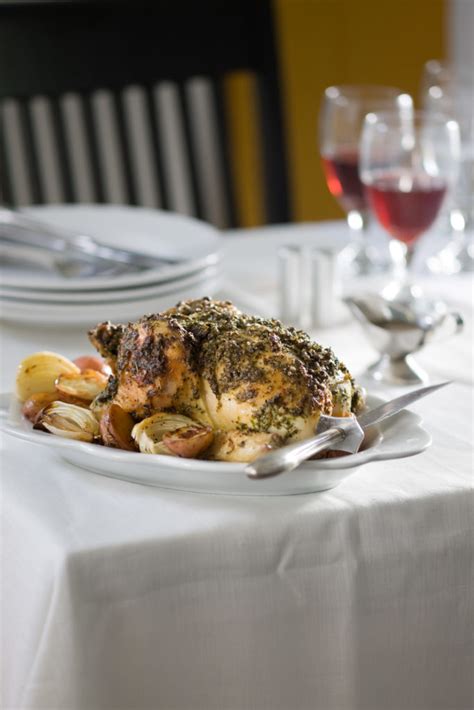 roast-chicken-with-garlic-lemon-and-parsley-relish image