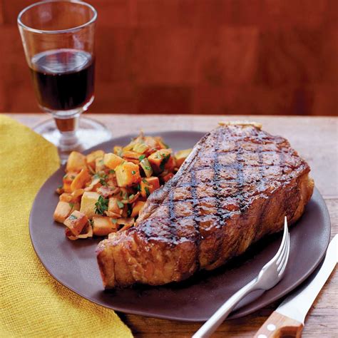 grilled-strip-steaks-with-sweet-potato-hash-browns image