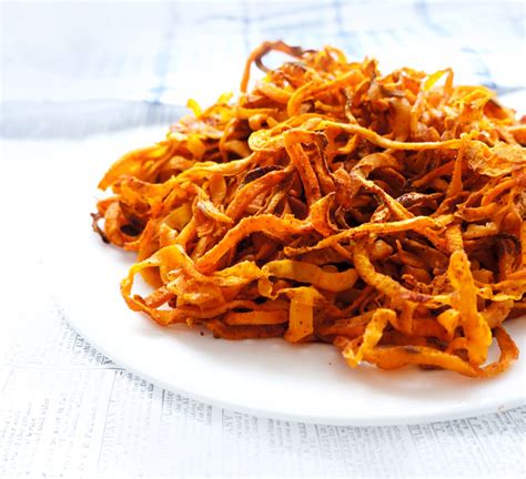 curly-sweet-potato-fries-haute-healthy-living image