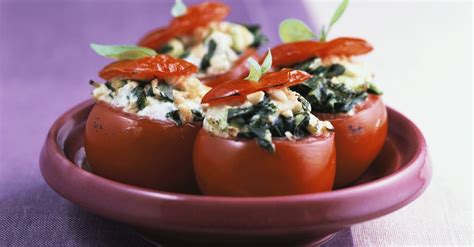baked-tomatoes-stuffed-with-spinach-and-cream-cheese image