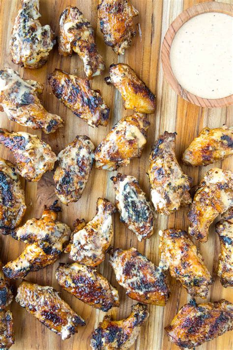 brined-grilled-chicken-wings-with-alabama-white-bbq image