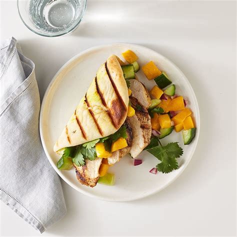 curry-grilled-chicken-naan-sandwich-with-mango-salsa image