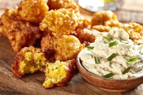 corn-fritters-with-ricotta-roasted-garlic-and-parsley image